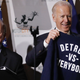 Detroit mayor Mike Duggan even gave Biden the appropriate sweatshirt. Photo credit: Carlos Osorio/AP Images